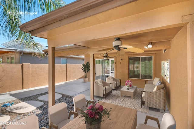 5897 E Cedarbird Dr, Tucson, AZ 85756 - view of patio / terrace featuring an outdoor hangout area and a ceiling fan