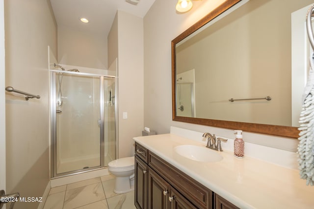 bathroom featuring marble finish floor, toilet, a stall shower, vanity, and recessed lighting