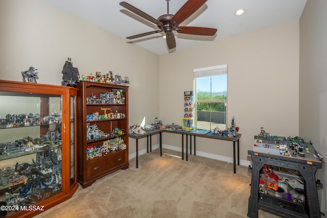 office featuring light colored carpet, recessed lighting, a ceiling fan, and baseboards