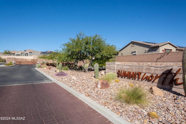 exterior space with fence and a residential view