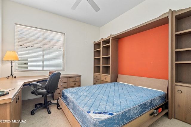 bedroom featuring a ceiling fan and light colored carpet