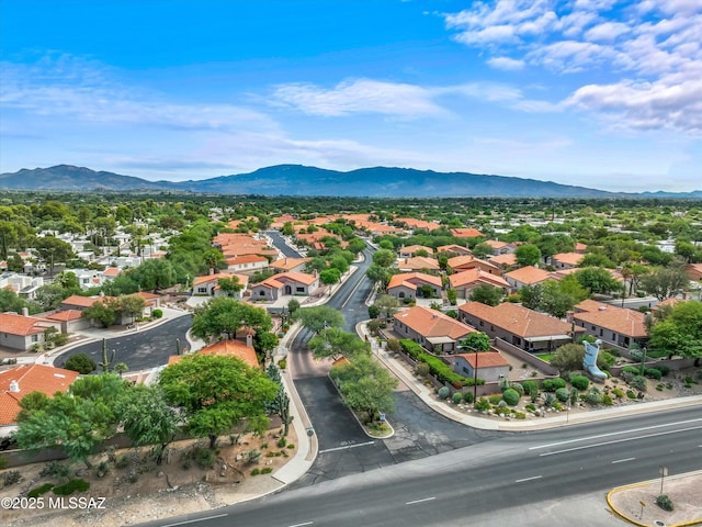 drone / aerial view with a residential view and a mountain view