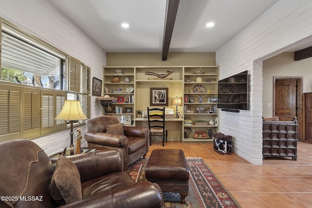 interior space featuring brick wall, tile patterned flooring, beam ceiling, and recessed lighting