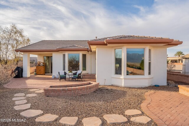 view of yard with a mountain view and a patio