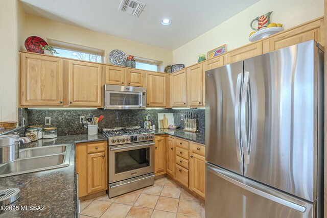 dining room with light tile patterned floors, lofted ceiling, recessed lighting, visible vents, and baseboards