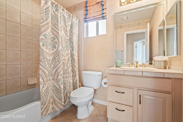 bathroom with tile patterned flooring, toilet, visible vents, vanity, and shower / bath combination with curtain