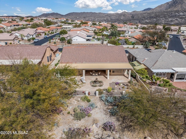 bird's eye view featuring a residential view and a mountain view