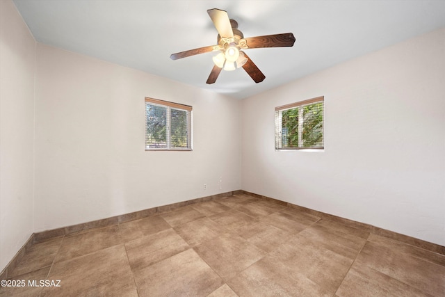 empty room with baseboards