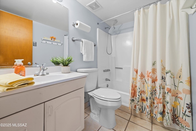 bathroom with visible vents, toilet, shower / tub combo with curtain, tile patterned floors, and vanity