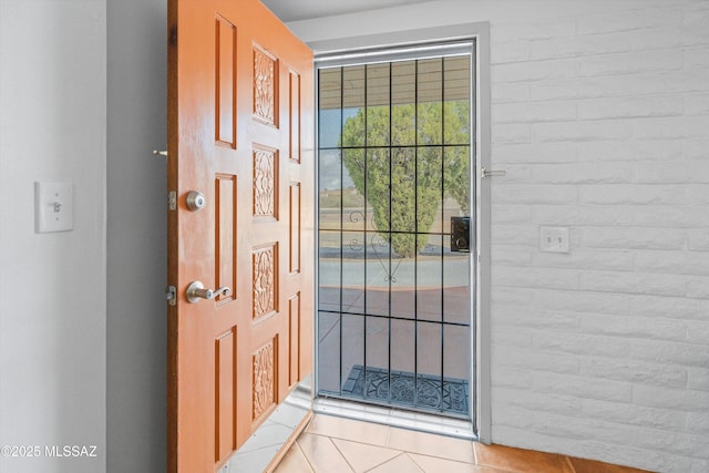 entryway featuring tile patterned flooring