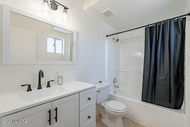 full bath with visible vents, toilet, shower / bath combo with shower curtain, vanity, and tile patterned floors