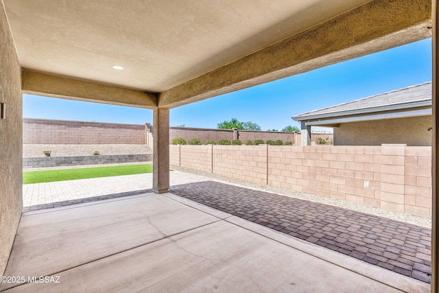 view of patio with a fenced backyard