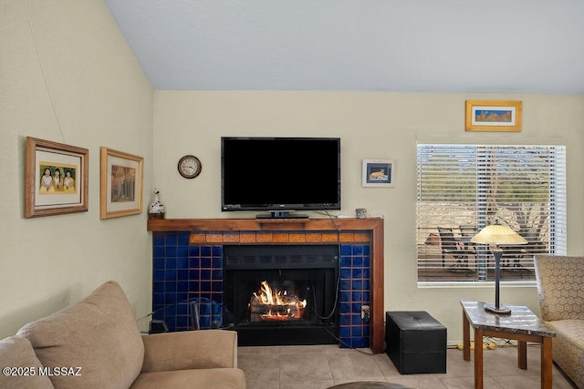 tiled living area with a tiled fireplace