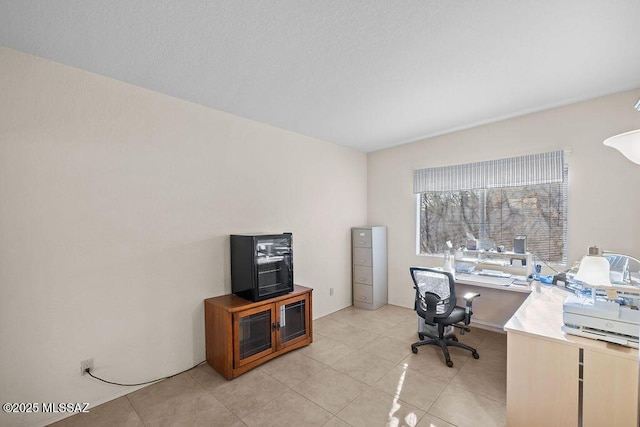 office space with light tile patterned floors