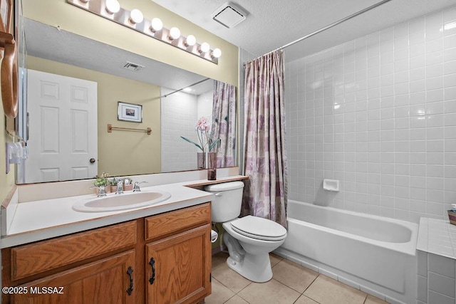 full bathroom featuring toilet, vanity, visible vents, tile patterned floors, and shower / bath combination with curtain