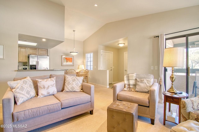 living room with baseboards, vaulted ceiling, recessed lighting, and light colored carpet