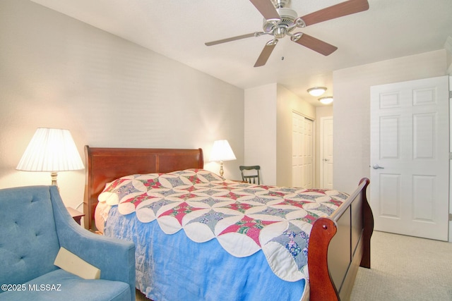 bedroom featuring a closet, carpet floors, and ceiling fan