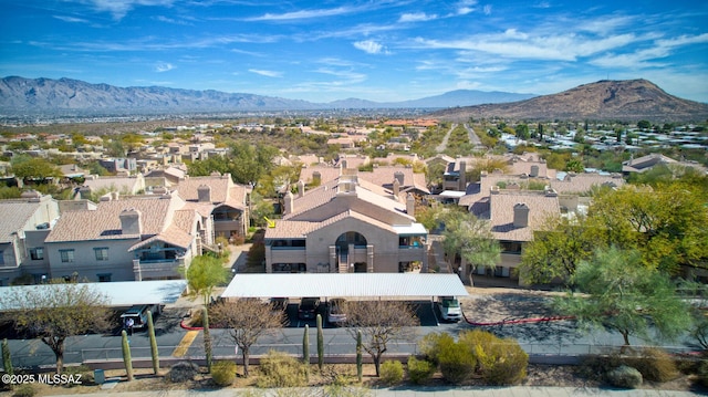 drone / aerial view with a residential view and a mountain view