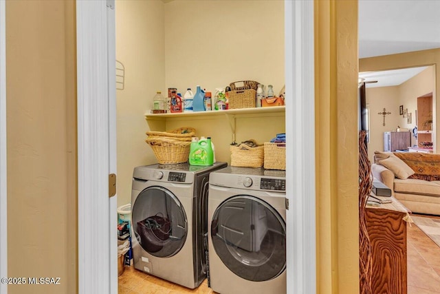 laundry room with laundry area and washing machine and dryer
