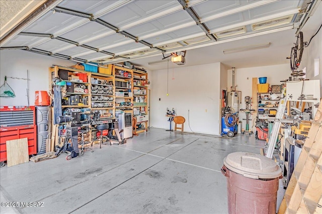 garage with a garage door opener and a workshop area