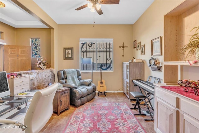 office area featuring light tile patterned floors and a ceiling fan