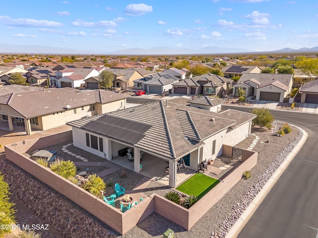 bird's eye view with a mountain view and a residential view