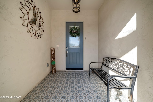 doorway to property with stucco siding