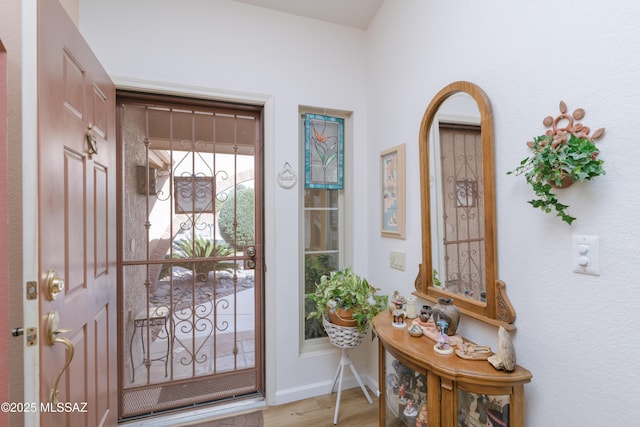 838 E Desert Glen Dr, Oro Valley, AZ 85755 - entryway with wood finished floors and baseboards