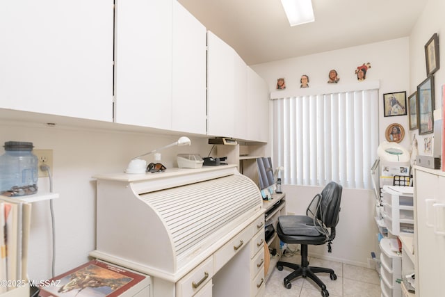 home office featuring light tile patterned flooring