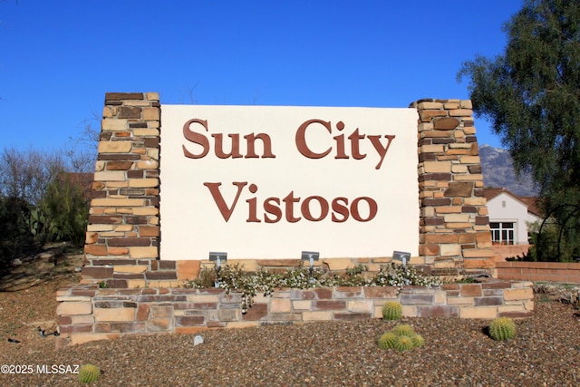 view of community sign