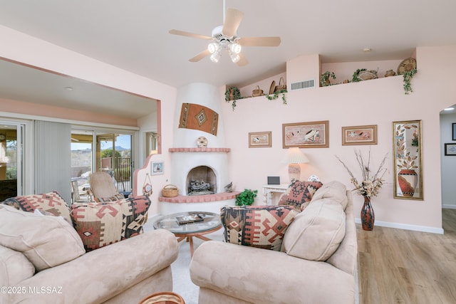 838 E Desert Glen Dr, Oro Valley, AZ 85755 - living area featuring wood finished floors, ceiling fan, and baseboards