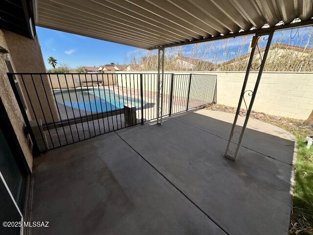 view of patio featuring a fenced in pool and a fenced backyard