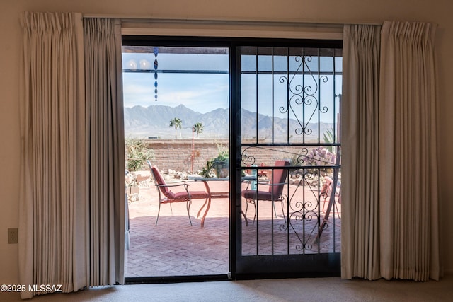 doorway featuring a mountain view