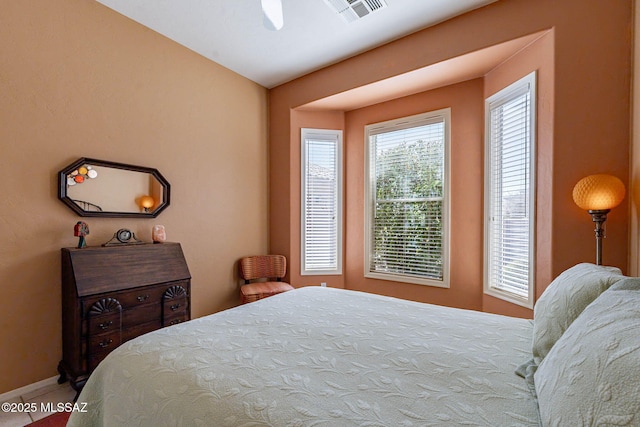 bedroom with visible vents