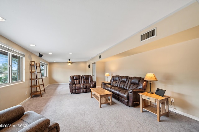 living room featuring visible vents, recessed lighting, baseboards, and carpet