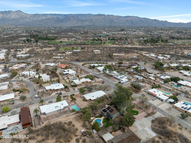 drone / aerial view featuring a mountain view