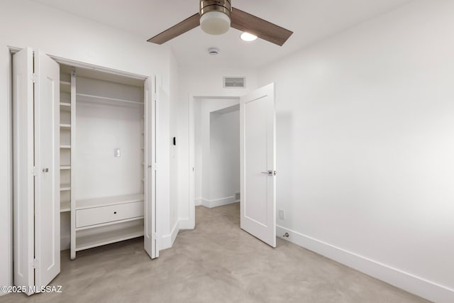 unfurnished bedroom with a closet, visible vents, ceiling fan, and baseboards