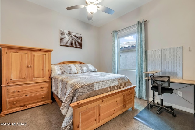 bedroom featuring ceiling fan, carpet flooring, and baseboards