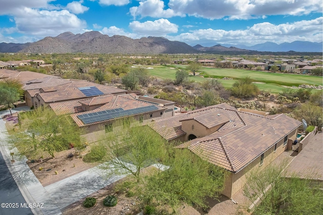 birds eye view of property featuring a mountain view