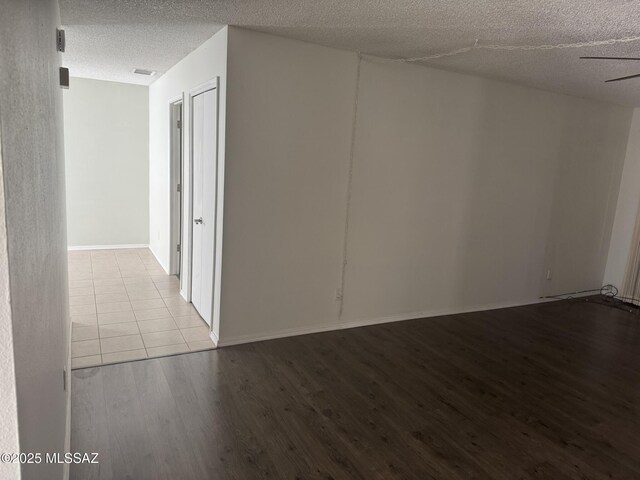 1117 E Irene St, Pearce, AZ 85625 - spare room with light wood finished floors, visible vents, and a textured ceiling