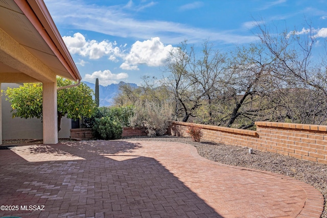 view of patio with a mountain view