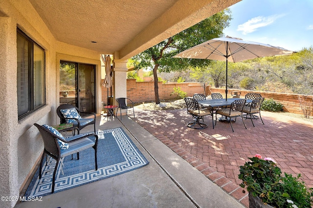 view of patio / terrace featuring a fenced backyard and outdoor dining space