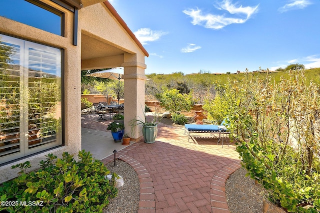 view of patio / terrace featuring outdoor dining space and a fenced backyard