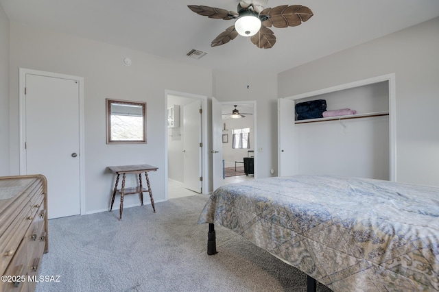 bedroom featuring carpet, multiple windows, ceiling fan, and a closet