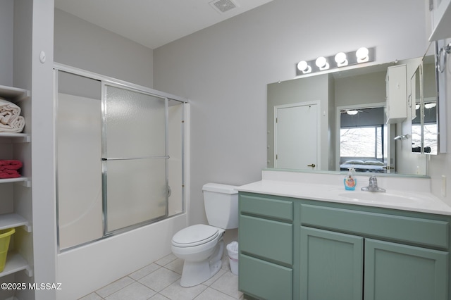 ensuite bathroom featuring ensuite bathroom, toilet, vanity, visible vents, and tile patterned floors