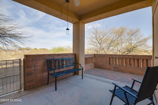 view of patio featuring a ceiling fan