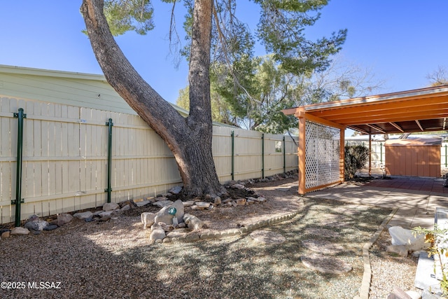 view of yard with a fenced backyard