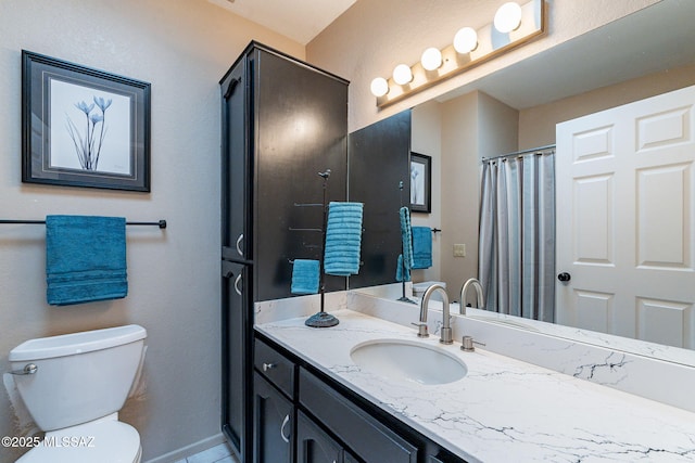 full bath with vanity and toilet