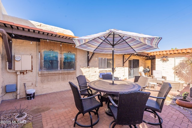 view of patio with outdoor dining space