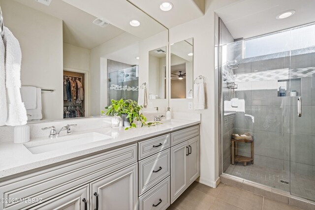 bedroom featuring light colored carpet, visible vents, ensuite bathroom, and recessed lighting